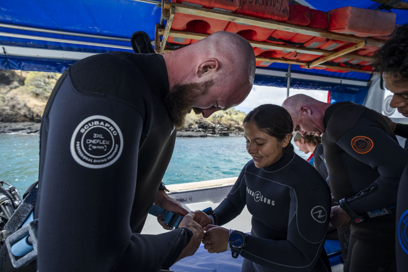 Divers aboard a Scuba Iguana dive boat