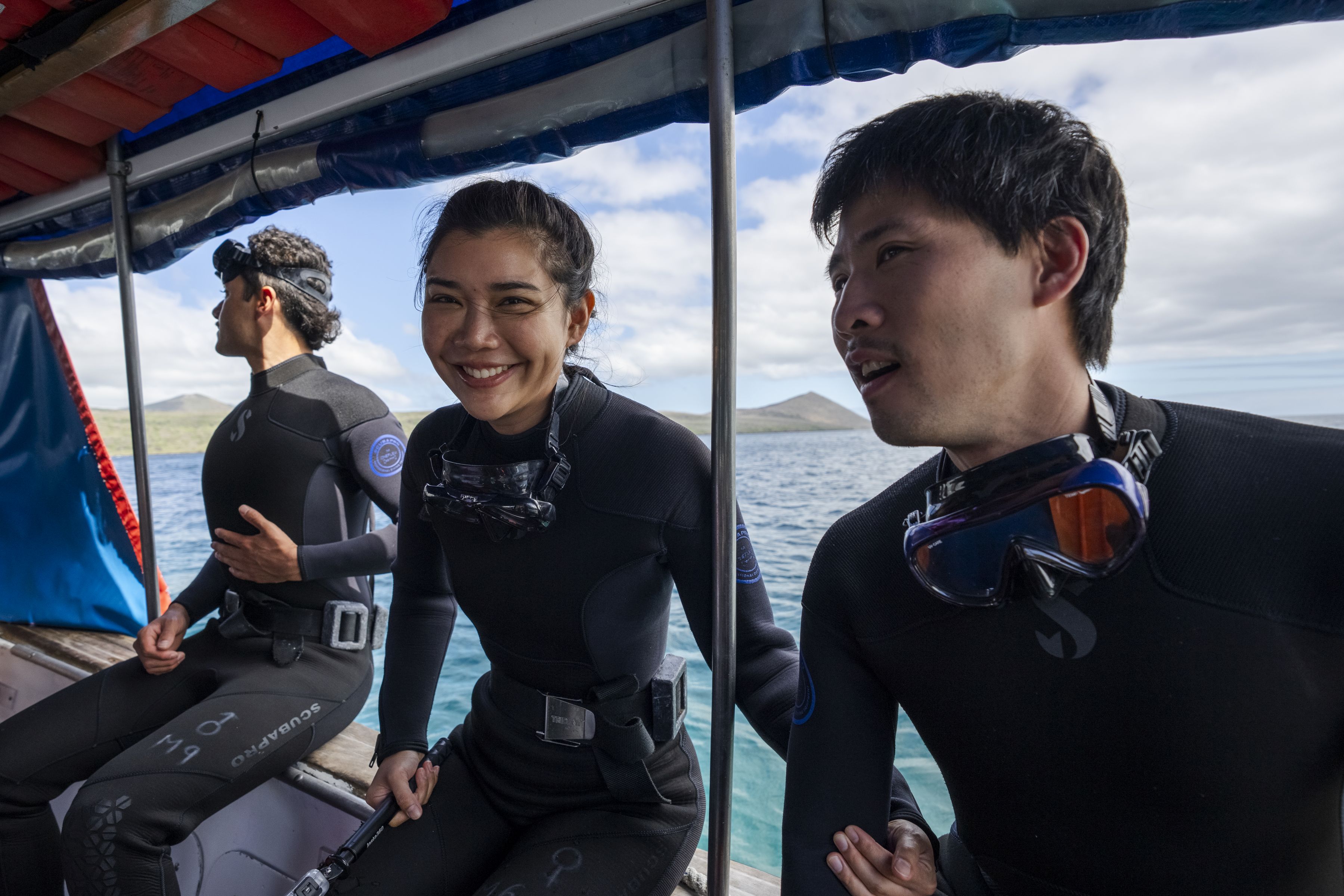 Divers aboard a Scuba Iguana dive boat