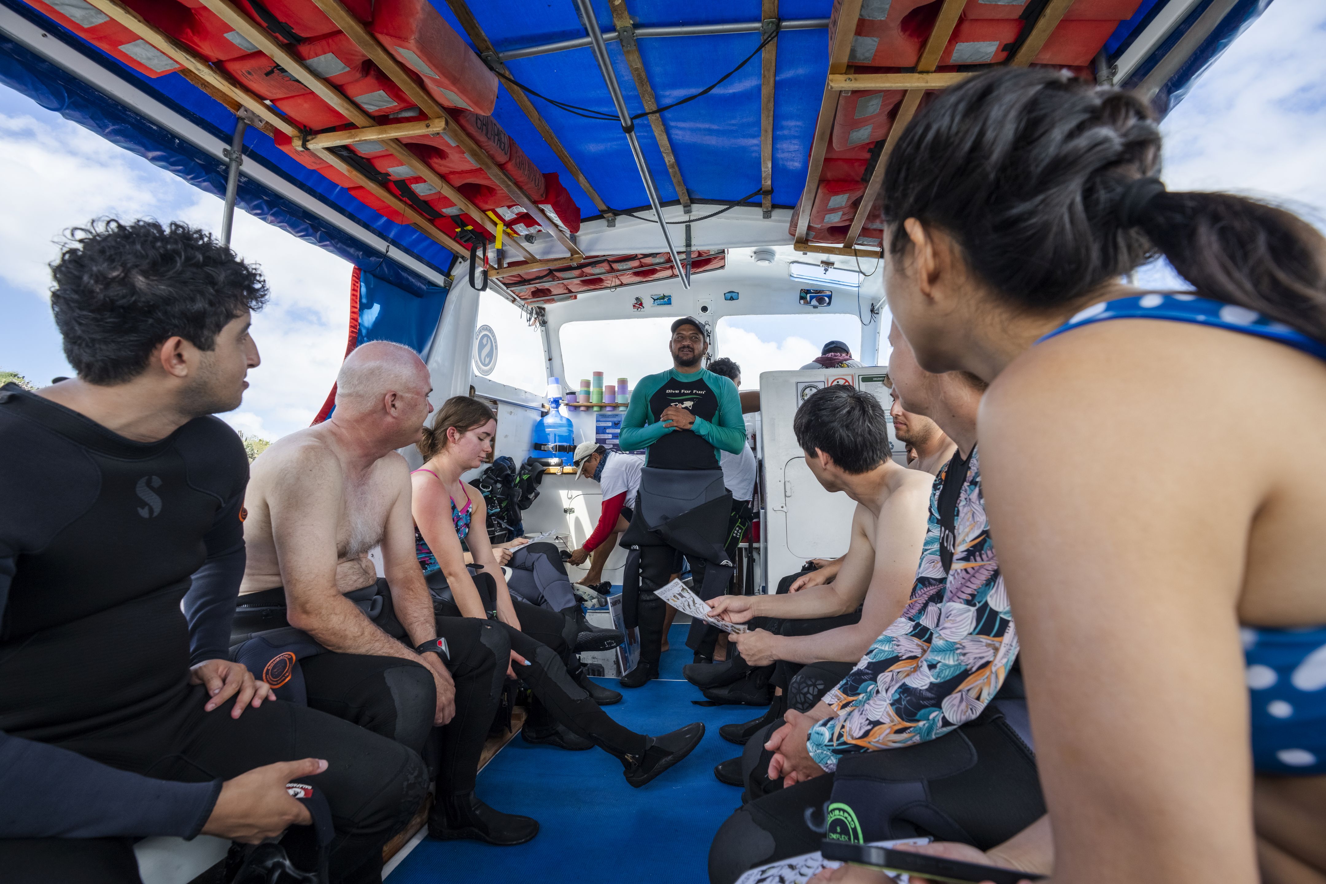 Divers aboard a Scuba Iguana dive boat